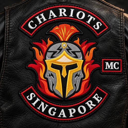 Solid printed patch with detailed shading shown for a custom motorcycle club patch system in production studio.