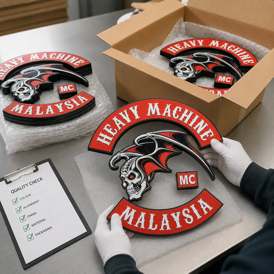 Custom motorcycle club plaques inspected and packed for worldwide shipping.