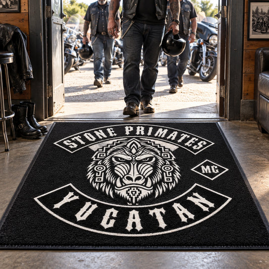 A custom motorcycle club entrance rug welcomes riders arriving at a clubhouse.