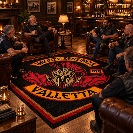 Motorcycle club members gather around a custom logo rug in a clubhouse lounge.