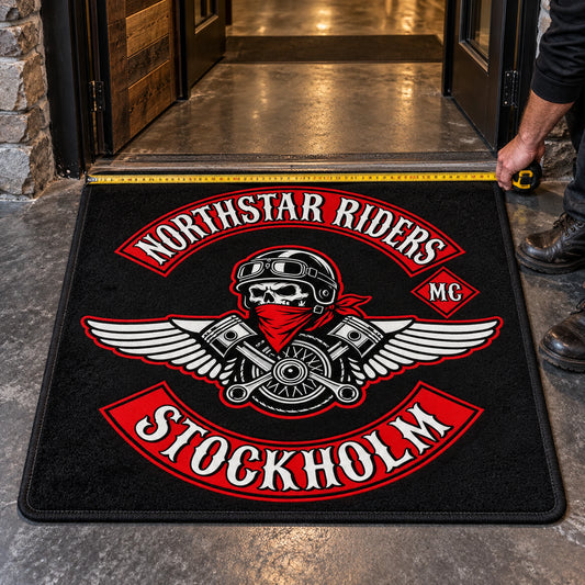 A rectangular custom motorcycle club rug is measured at a clubhouse entrance.