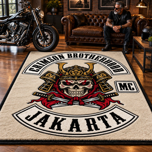 A motorcycle club member stands beside a large tufted clubhouse area rug, a full-size V-twin motorcycle and a leather sofa.