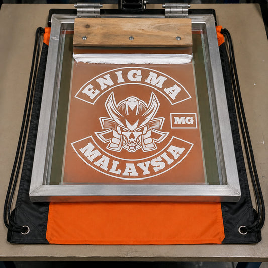 An orange and black two-tone polyester motorcycle club drawstring bag receives a bold screen print.