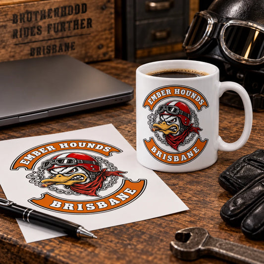 Complete logoed mug beside the supplied club artwork printed on a clean proof sheet and a closed laptop, representing artwork intake without people.