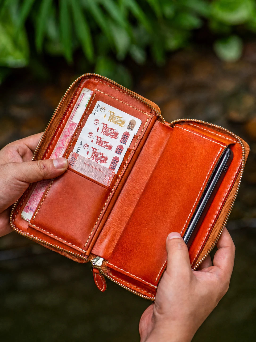 open Ganesha leather phone wallet with card slots and zipper