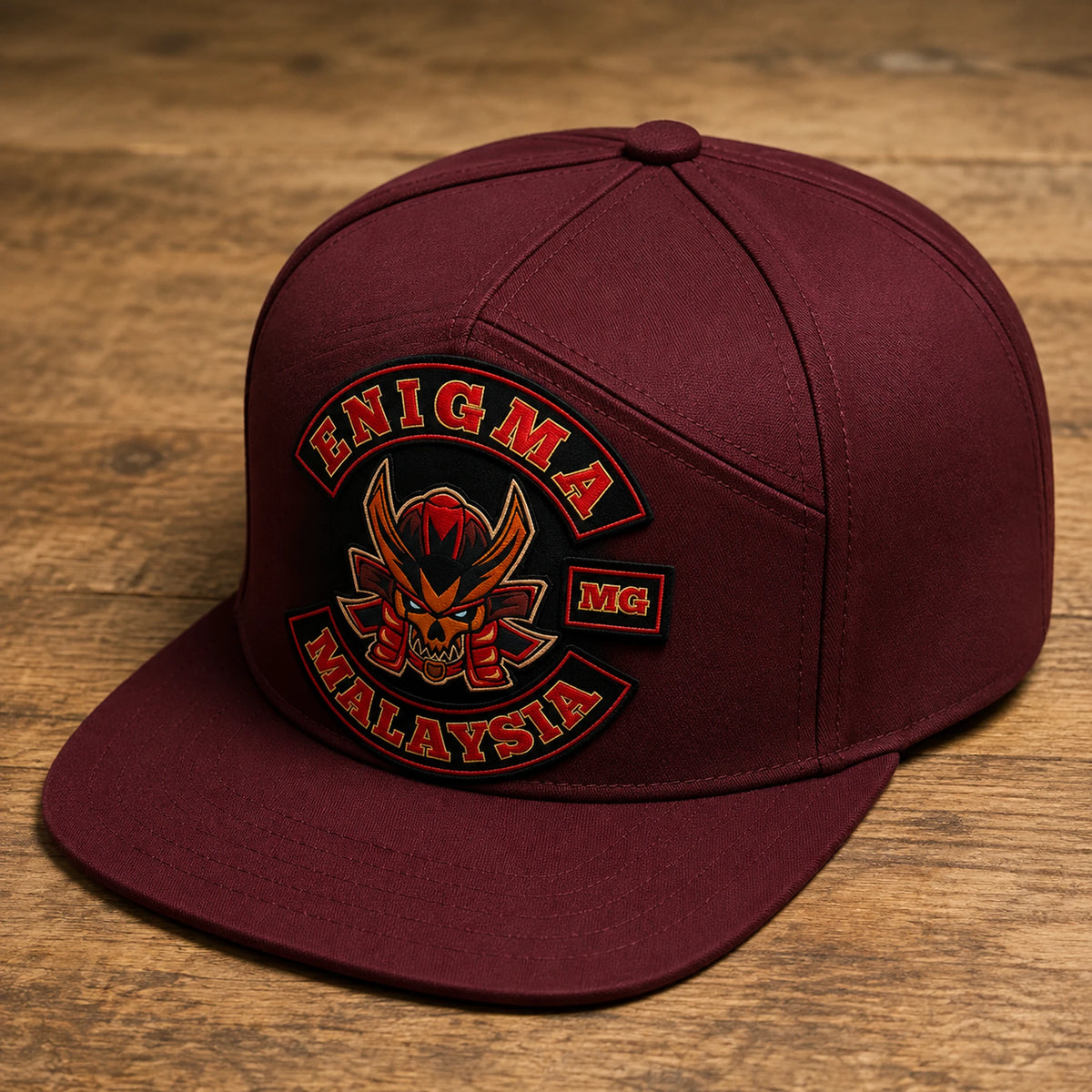 A burgundy motorcycle club seven-panel cap shows distinctive crown construction and a straight visor.