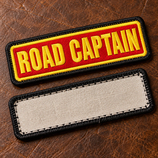 Front and back views of a sew-on motorcycle club name bar showing a clean unfinished backing edge and stitch-ready border on a leather workbench, showing custom motorcycle club name bar patch options.