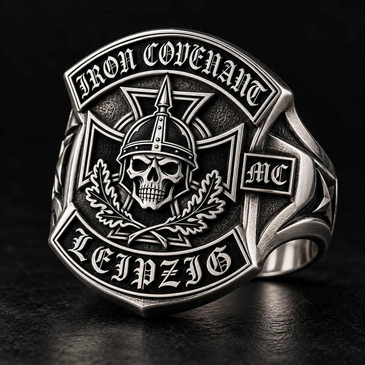 Shield-shaped white copper motorcycle club ring built around an Iron Covenant club emblem.