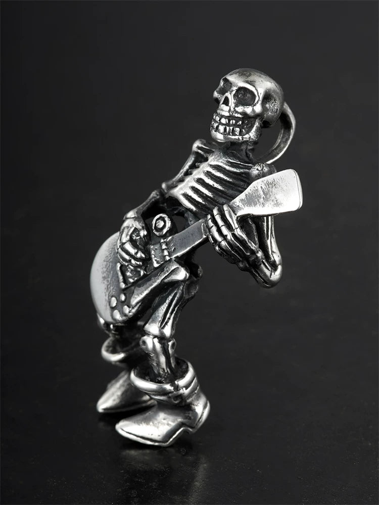Rock guitarist skeleton silver pendant angled view