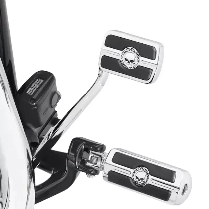 Chrome skull brake pedal pad installed on Harley Softail forward controls