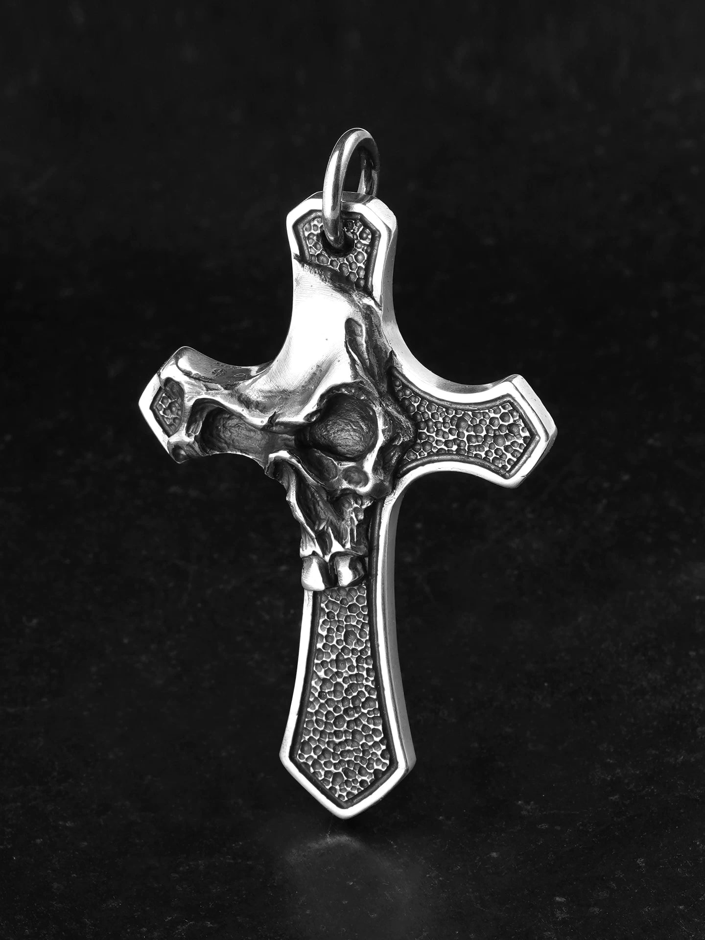 Front view of sterling silver skull cross biker pendant