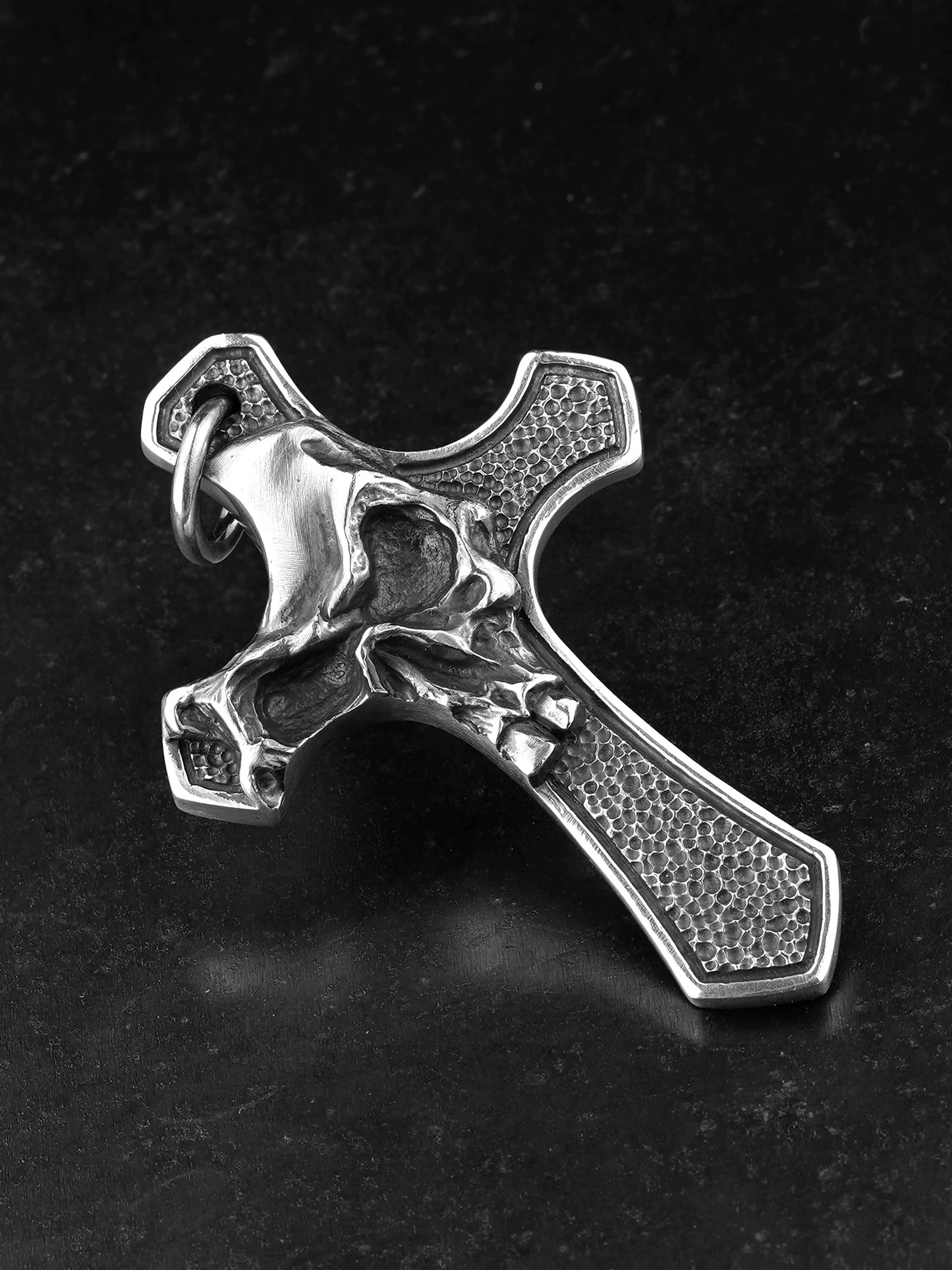 Side view of handcrafted 925 silver skull cross pendant