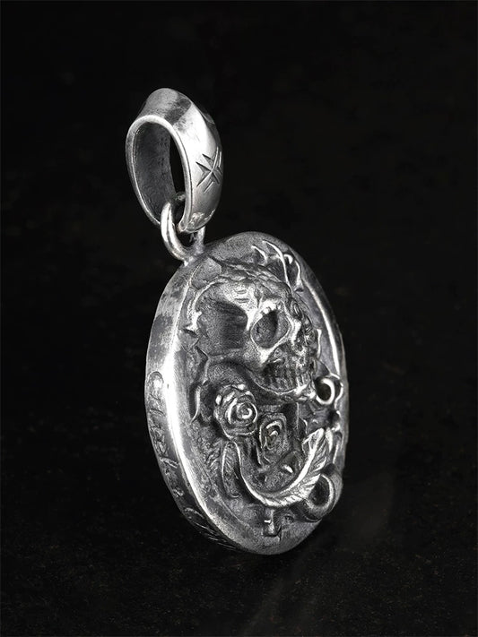 Skull and rose medallion sterling silver biker pendant, angled view