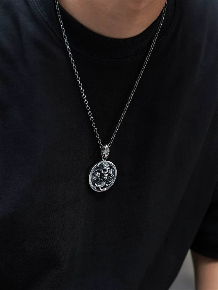 Skull and rose medallion sterling silver biker pendant on model