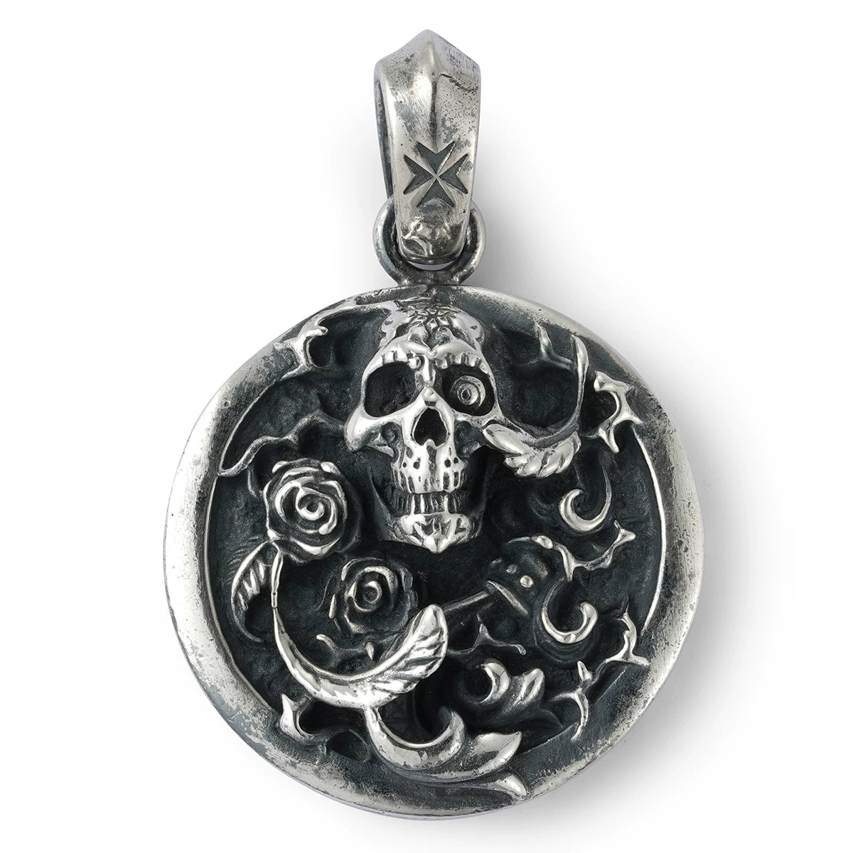Skull and rose medallion sterling silver biker pendant on white background