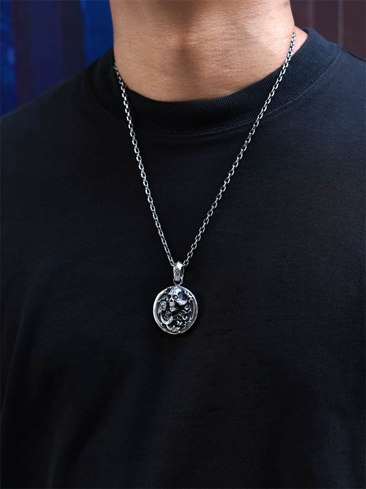 Skull and rose medallion sterling silver biker pendant worn on chain