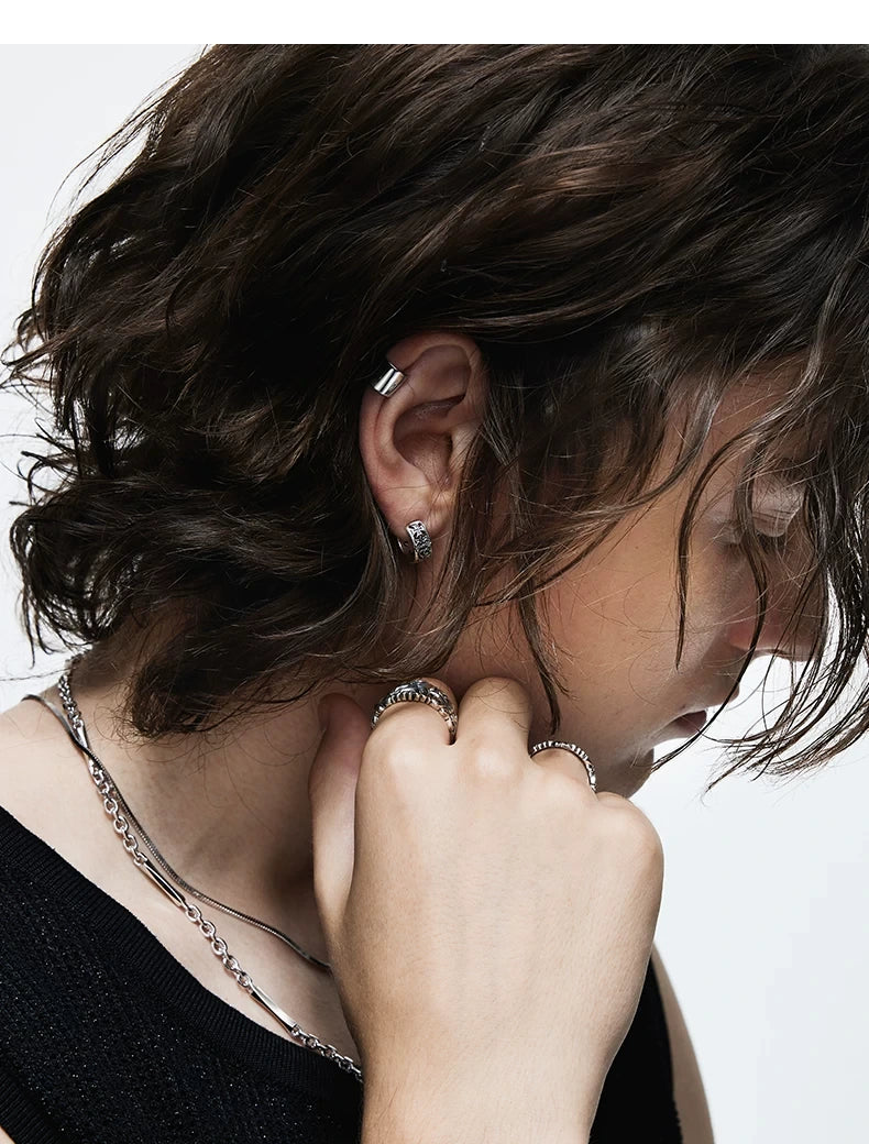 Sterling Silver Biker Clip-On Earrings for Bikers shown in a rider lifestyle view 2