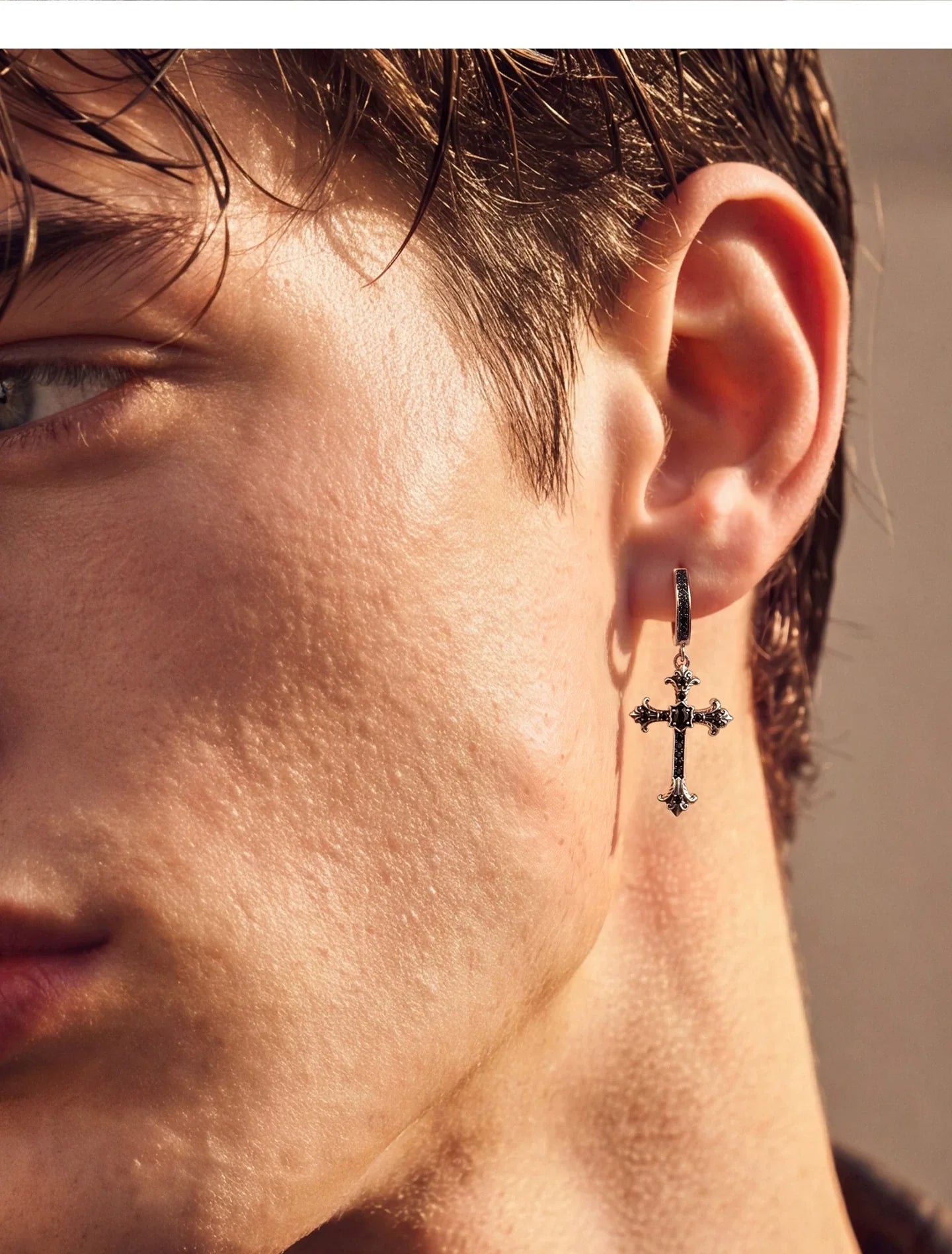 Sterling Silver Black Crystal Cross Drop Earrings for Bikers shown in a rider lifestyle view 4