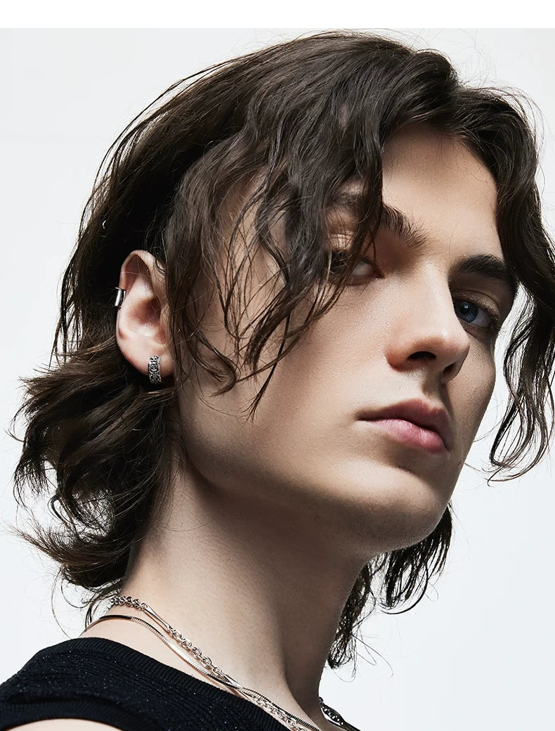 Sterling Silver Cross Clip-On Earrings for Bikers shown in a rider lifestyle view 3