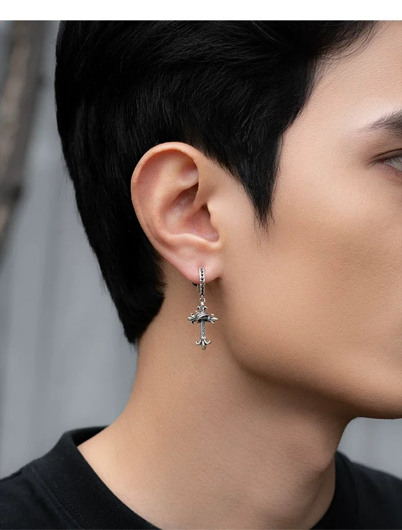 Sterling Silver Fleur-de-Lis Crown Cross Clip-On Earrings for Bikers shown in a rider lifestyle view 2