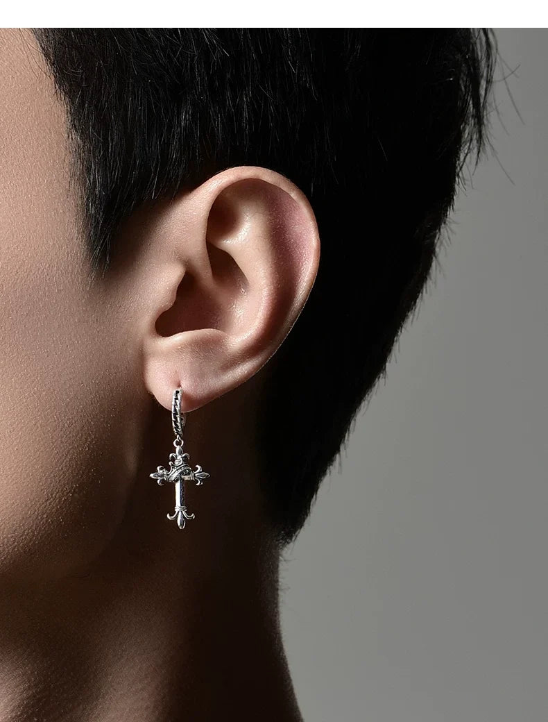Sterling Silver Fleur-de-Lis Crown Cross Drop Earrings for Bikers shown in a rider lifestyle view 3