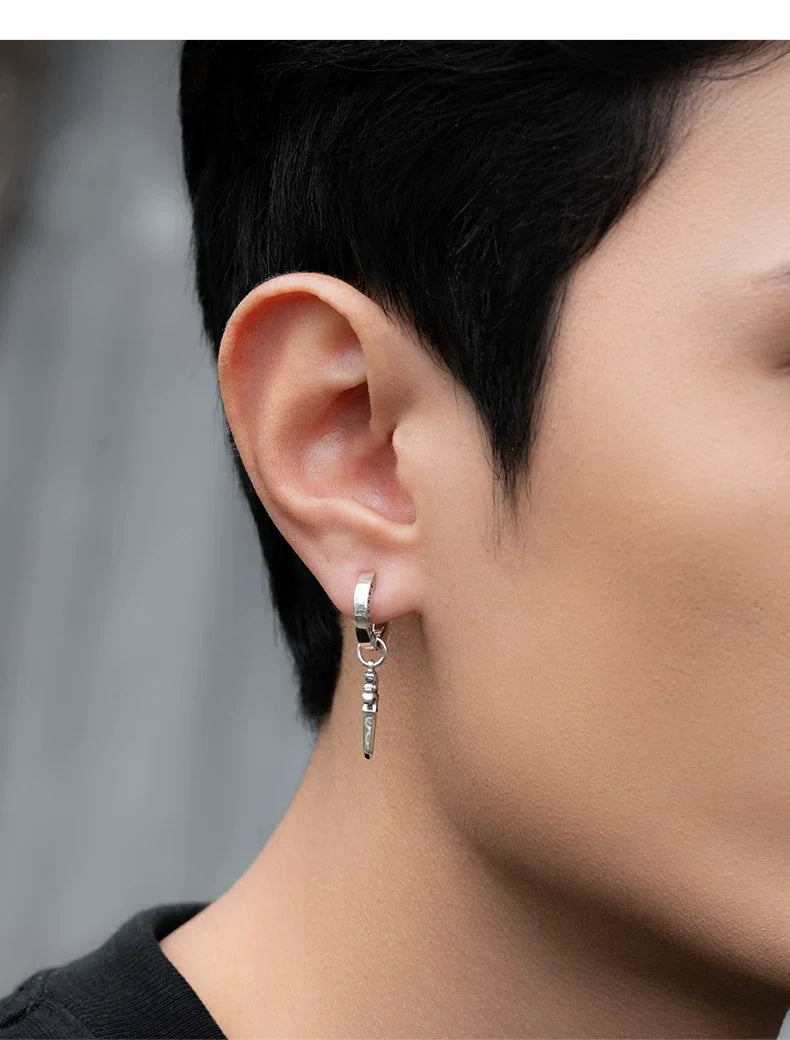 Sterling Silver Good Luck Sword Clip-On Earrings for Bikers shown in a rider lifestyle view 2