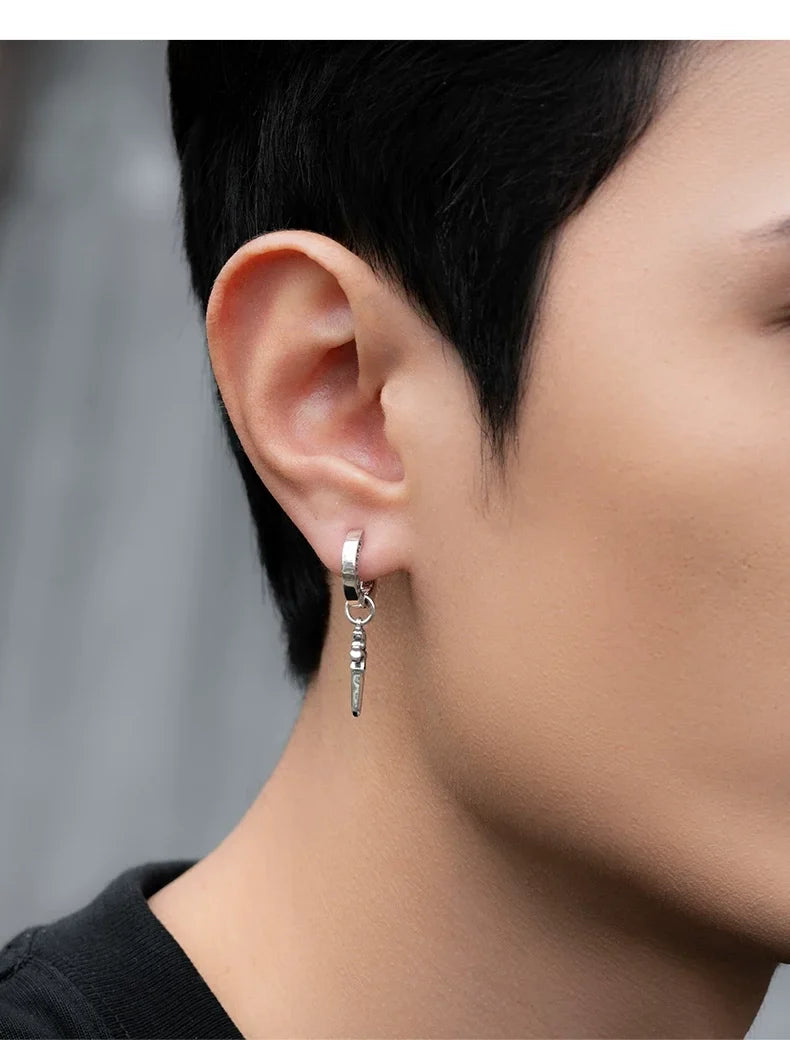 Sterling Silver Good Luck Sword Clip-On Earrings for Bikers shown in a rider lifestyle view 4