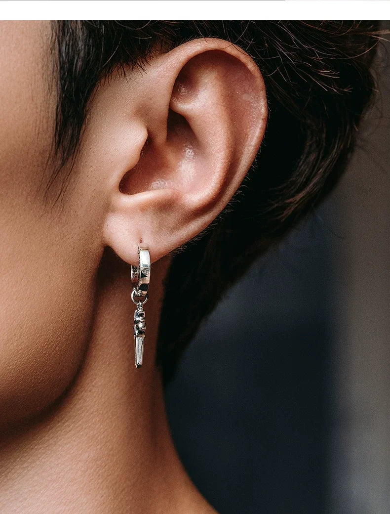 Sterling Silver Good Luck Sword Drop Earrings for Bikers shown in a rider lifestyle view 2