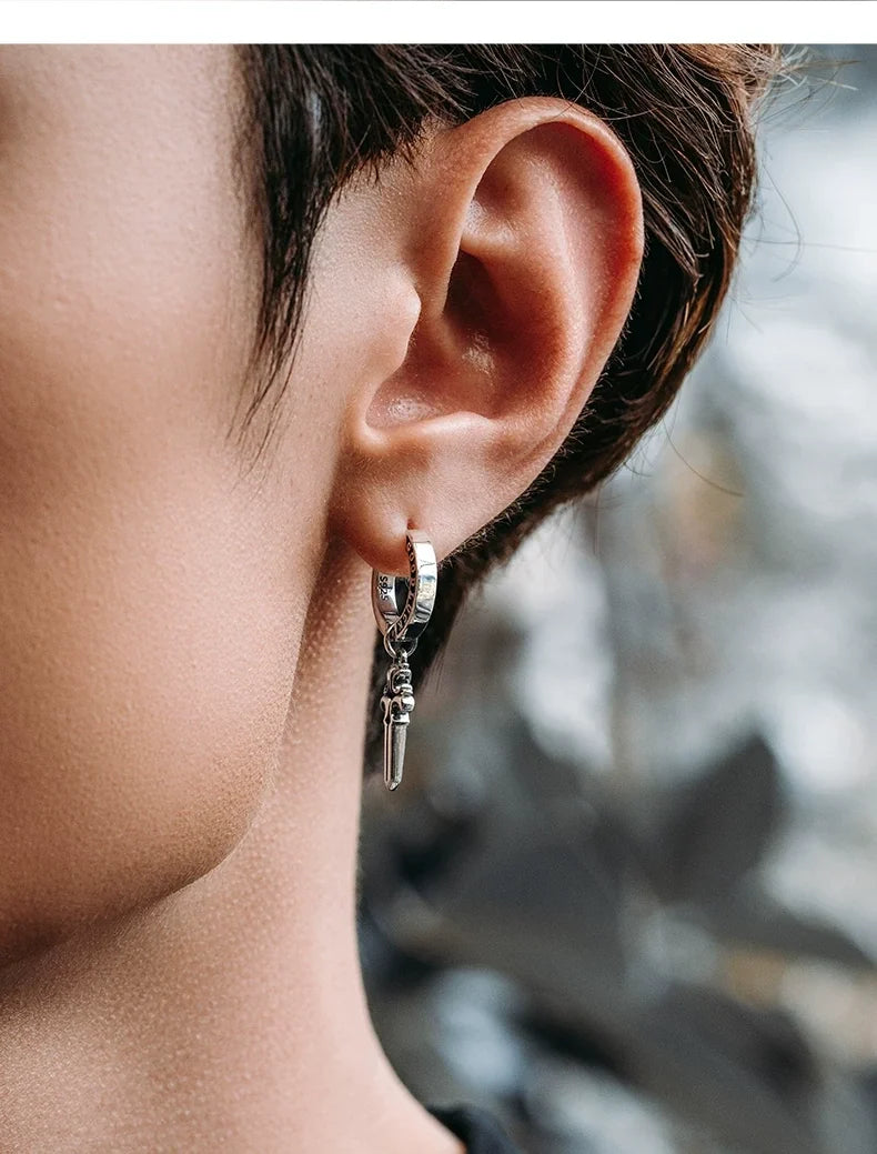 Sterling Silver Good Luck Sword Drop Earrings for Bikers shown in a rider lifestyle view 4