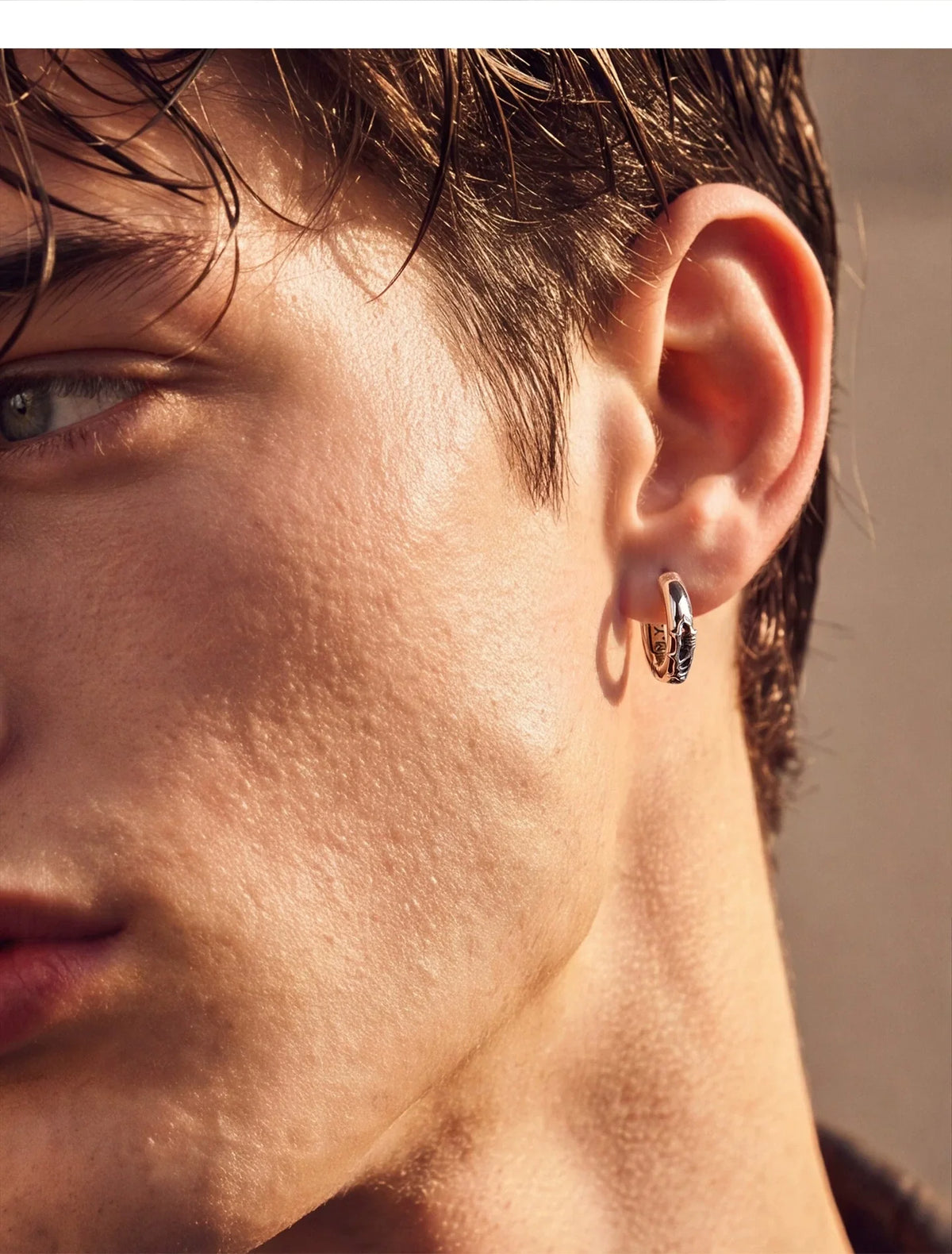 Sterling Silver Thorn Vine Drop Earrings for Bikers shown in a rider lifestyle view 2