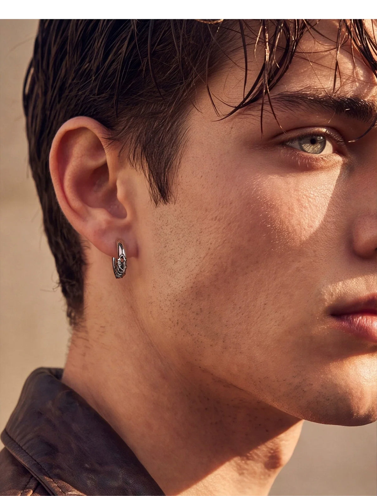 Sterling Silver Thorn Vine Drop Earrings for Bikers shown in a rider lifestyle view 3