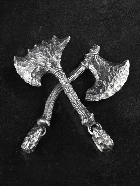 Two Stone Age axe sterling silver biker pendant styles shown together