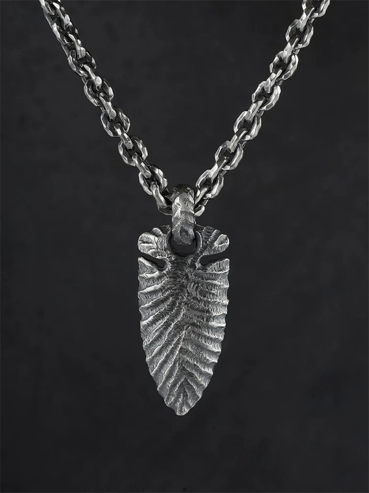 Stone Age spearhead sterling silver biker pendant displayed on chain