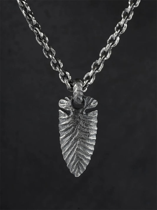 Stone Age spearhead sterling silver biker pendant displayed on chain