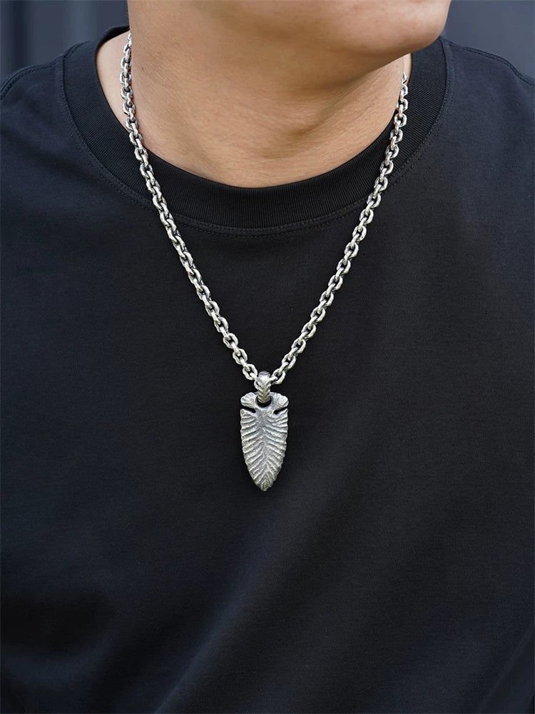 Stone Age spearhead sterling silver biker pendant worn for scale