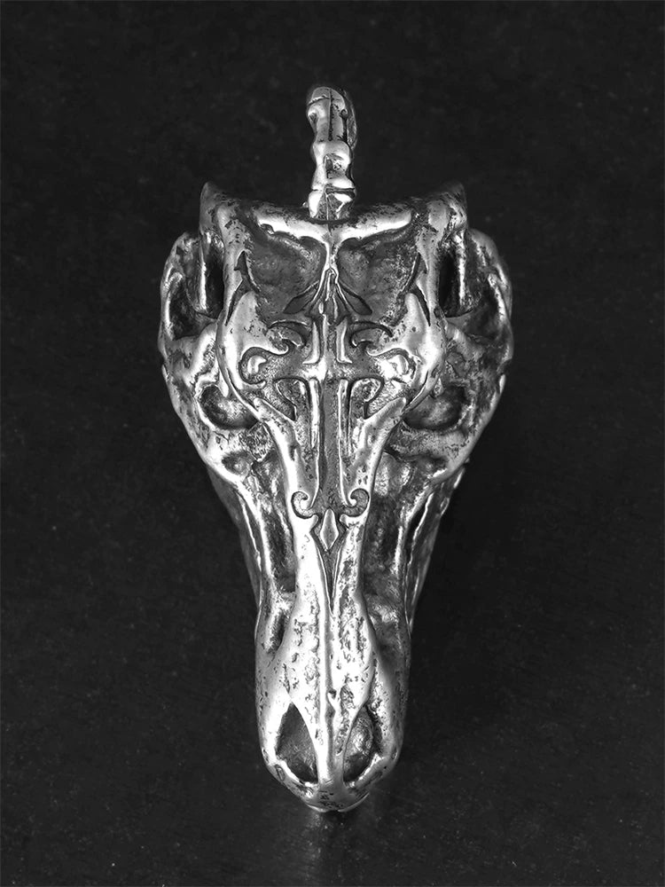 Top view of ornate T-Rex skull sterling silver pendant