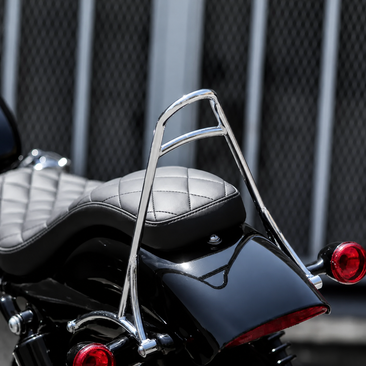 Chrome tall passenger backrest installed on a motorcycle