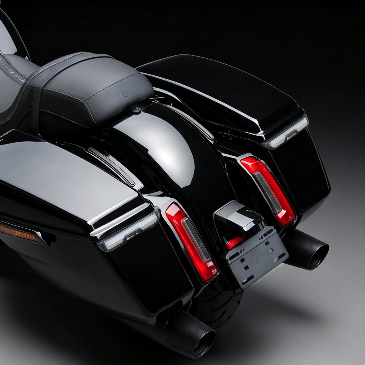 Red-lens saddlebag lights on black Harley-Davidson Touring