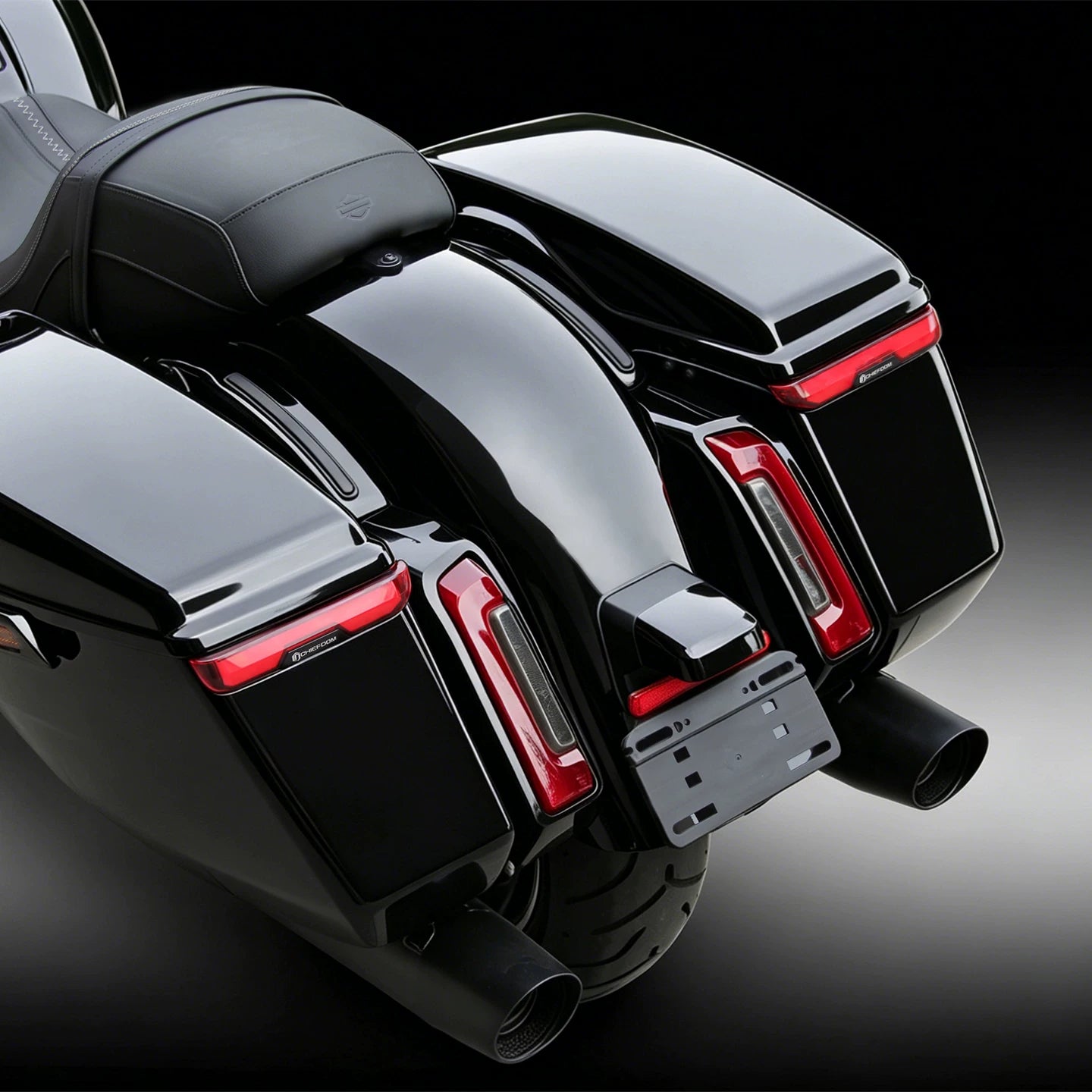 Smoke-lens saddlebag lights on black Harley-Davidson Touring