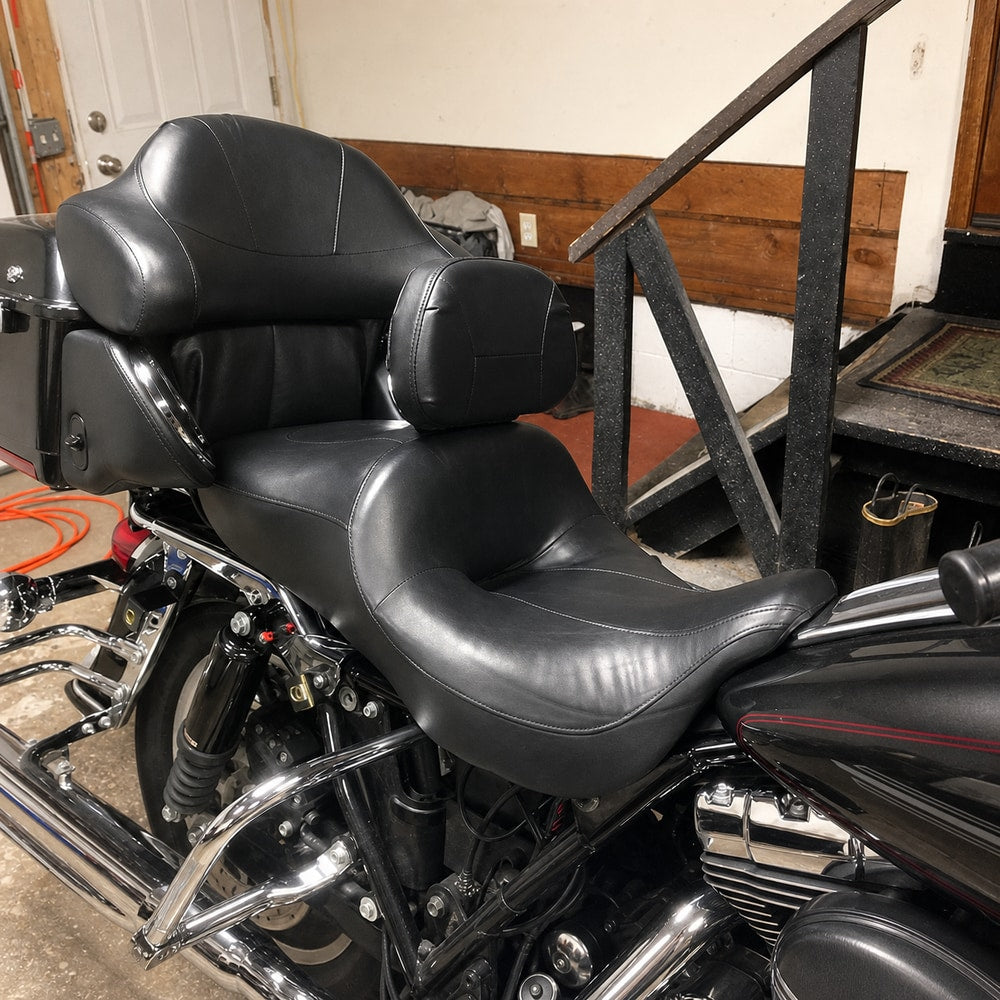 Adjustable hydraulic rider backrest for compatible touring motorcycles