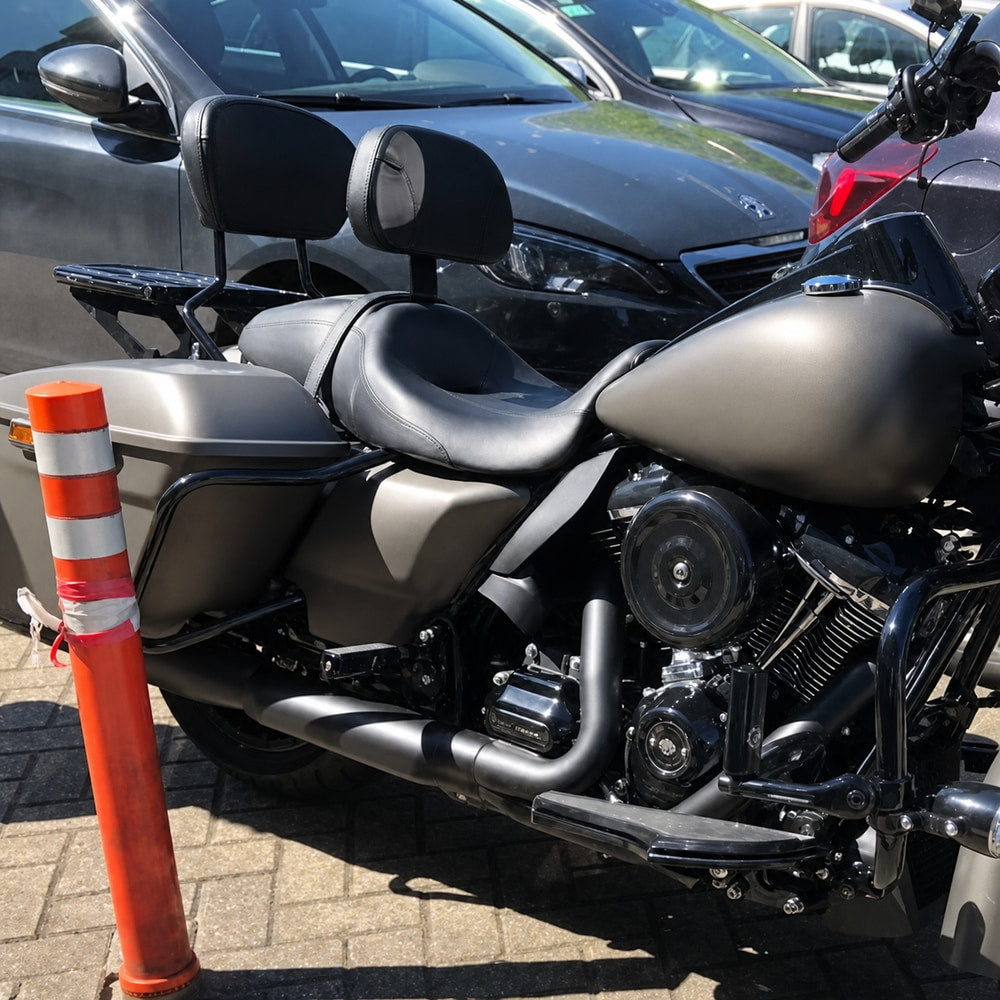 Adjustable hydraulic rider backrest for compatible touring motorcycles