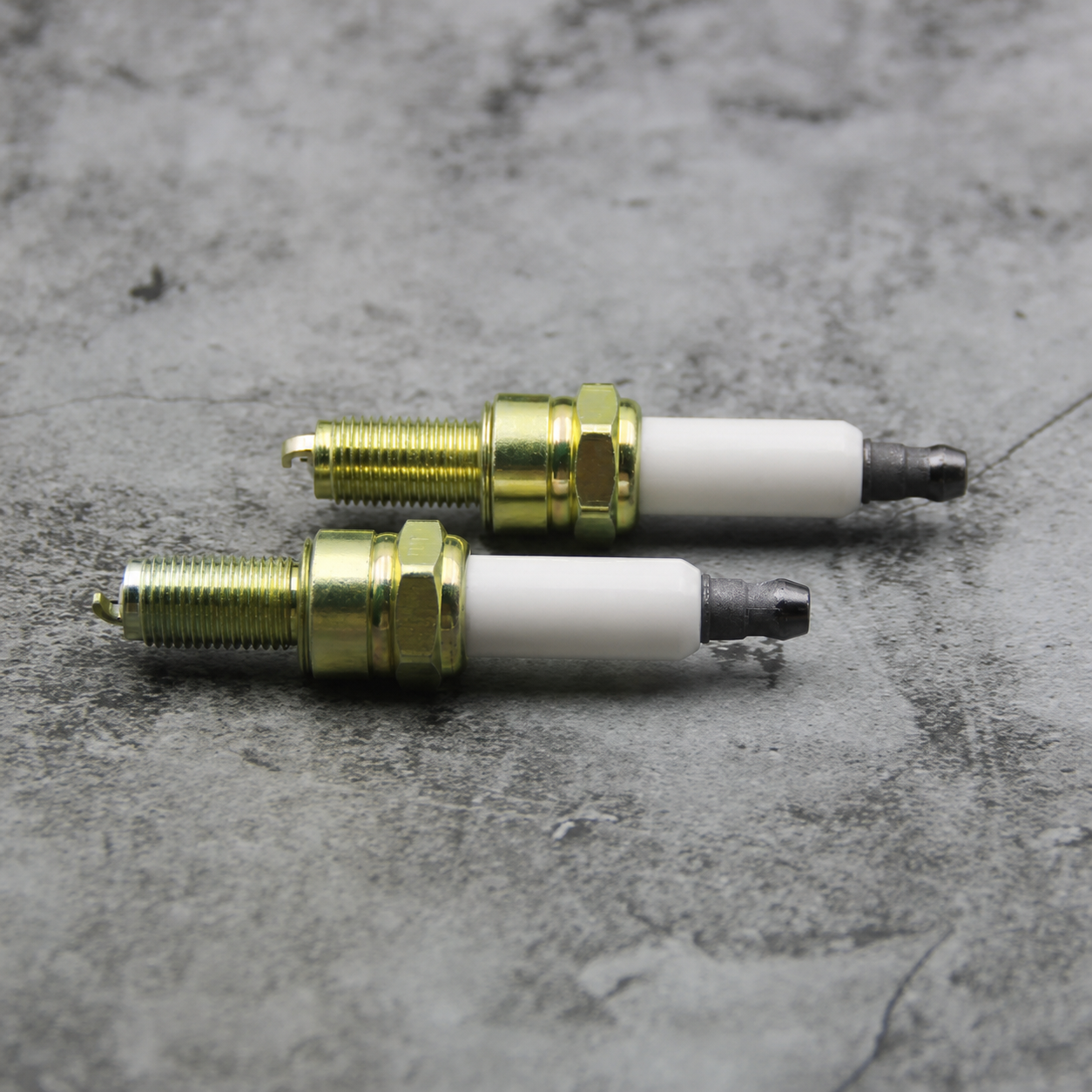 Gold-tone spark plugs