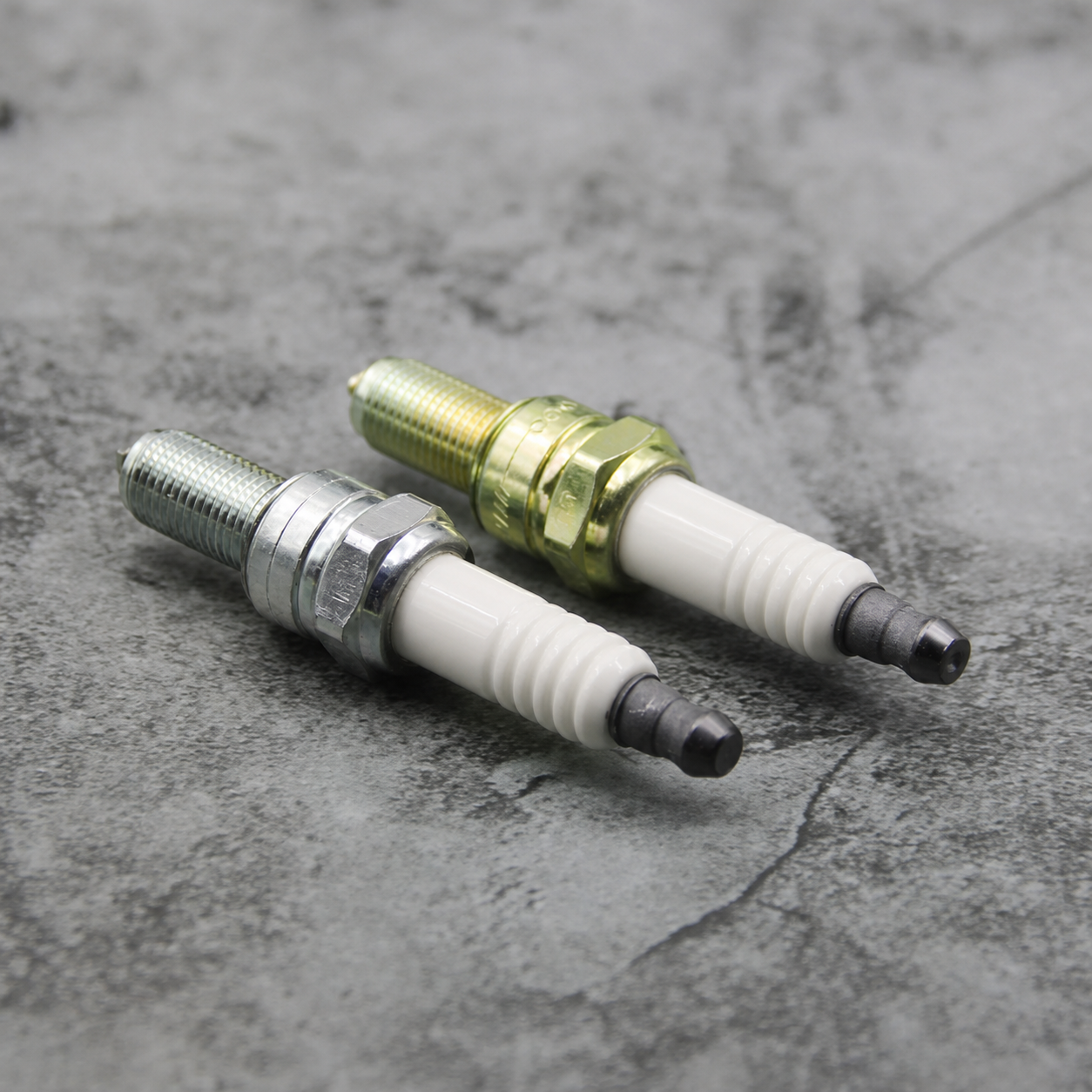 Spark plug finish comparison