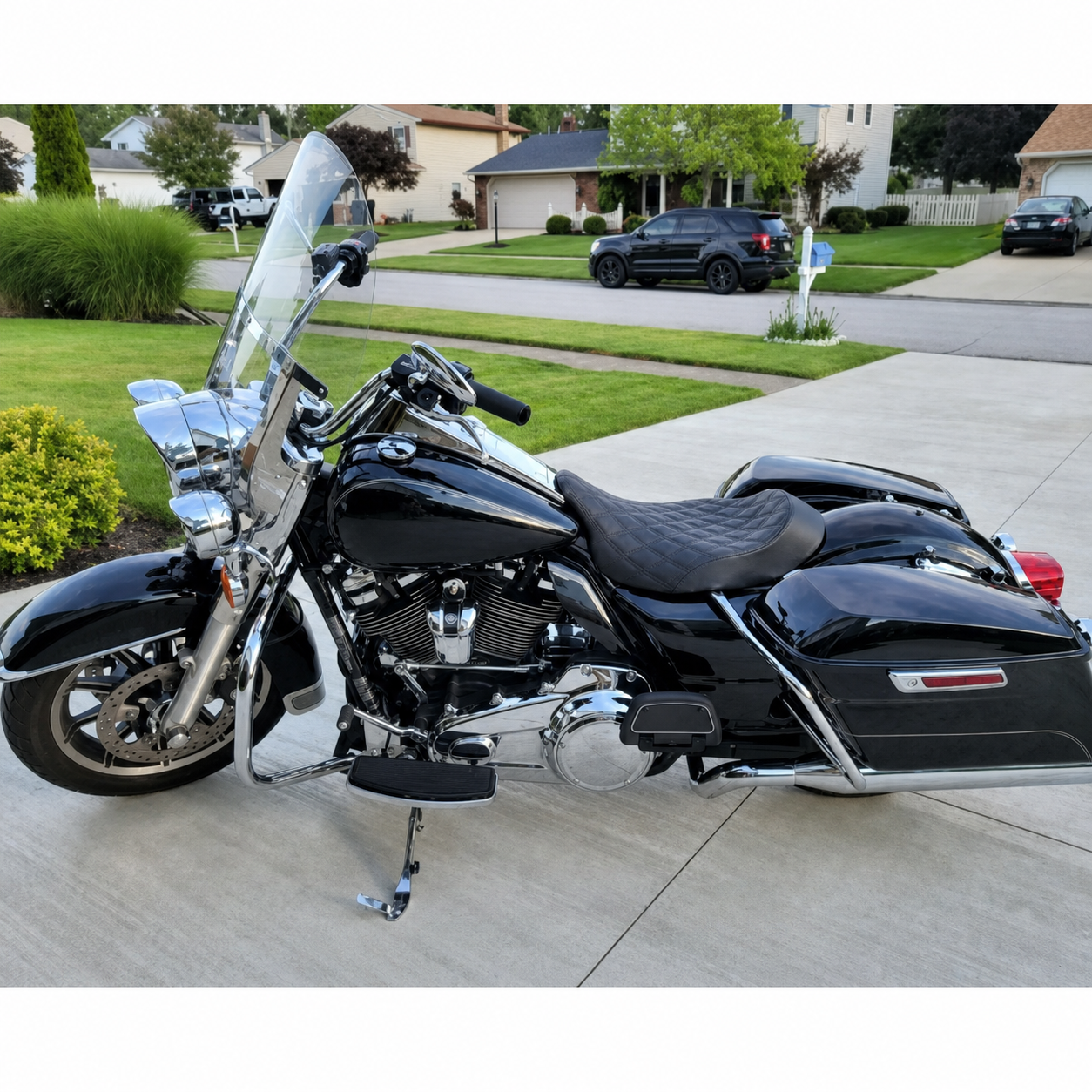 Brown diamond-stitched solo seat installed on motorcycle
