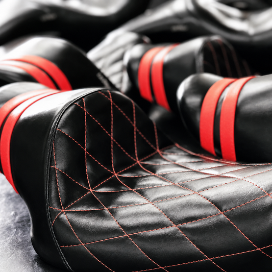 Red diamond stitched motorcycle solo seat close-up