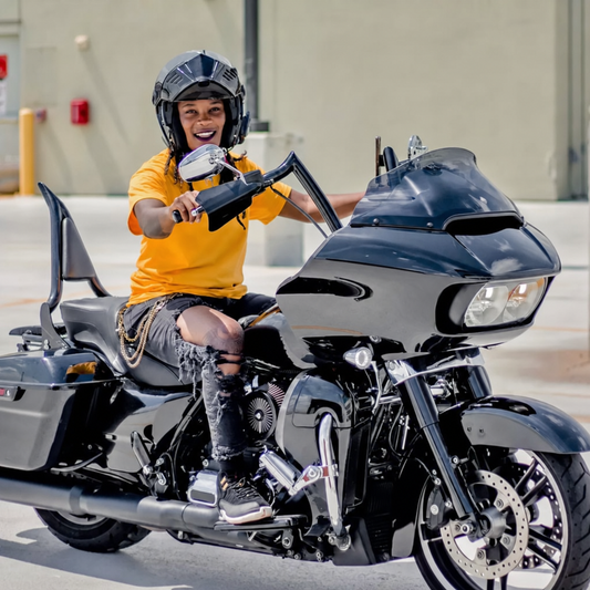 Black pointed sissy bar installed on touring motorcycle