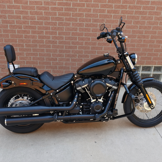 Black motorcycle with installed passenger backrest
