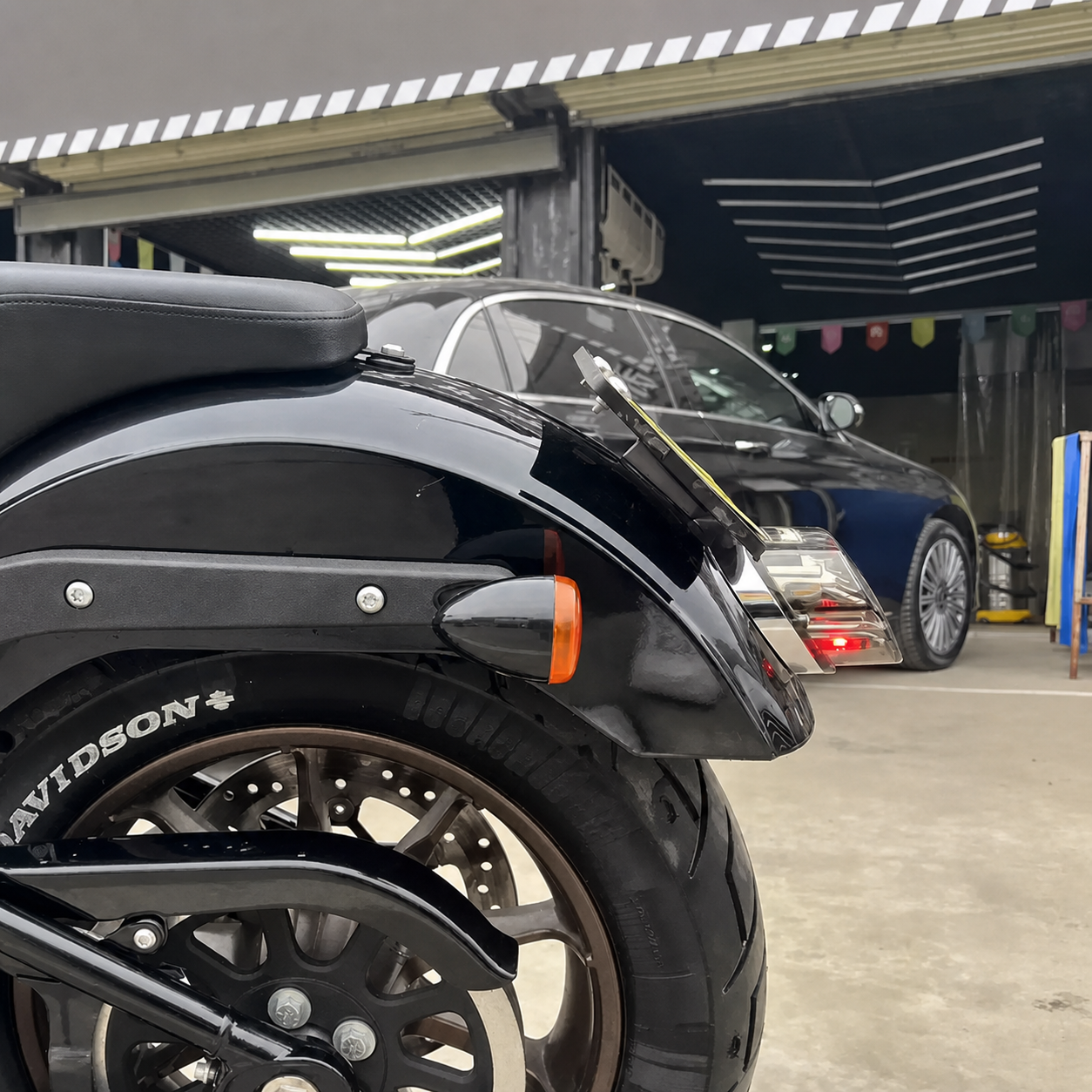 BLACK3 angled license plate bracket installed on Harley-Davidson Low Rider S