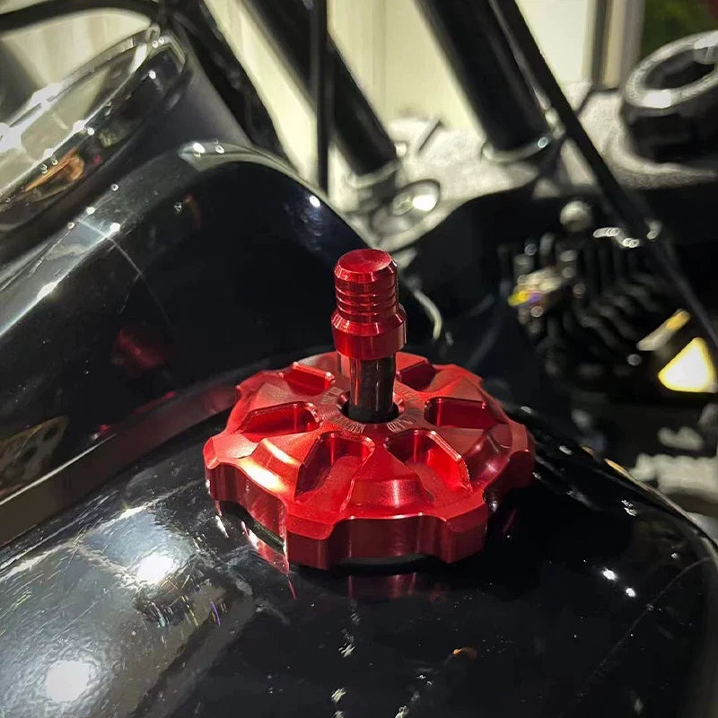 Red fuel cap installed