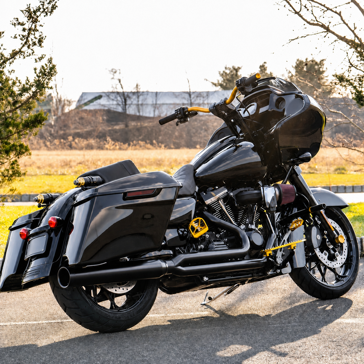 Black and gold custom touring motorcycle side view